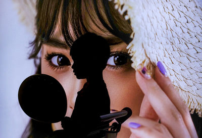 Close-up portrait of woman wearing mask