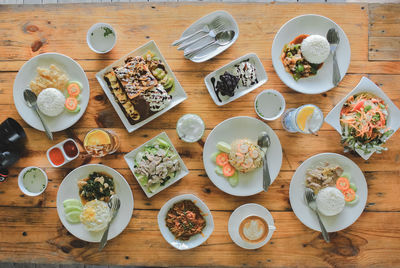 High angle view of breakfast served on table