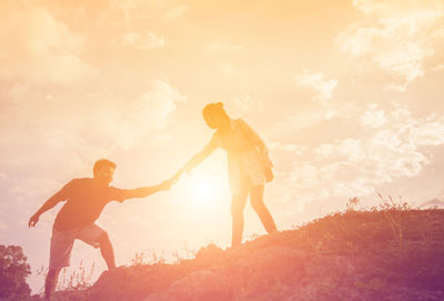 Friends enjoying at sunset