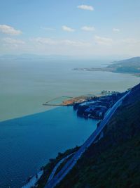 High angle view of bay against sky