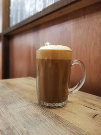 Close-up of coffee cup on table