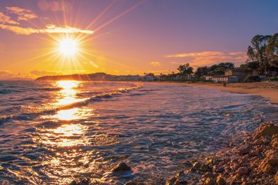 Scenic view of sea against sky during sunset