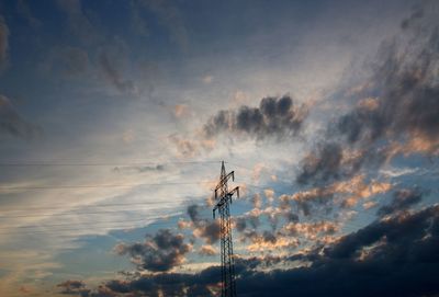 Low angle view of cloudy sky at sunset