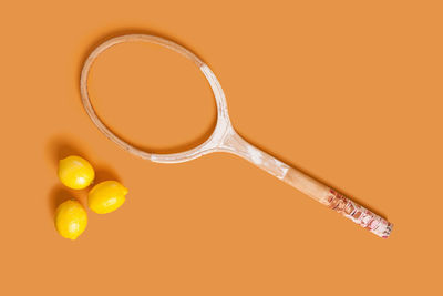 Close-up of orange over white background