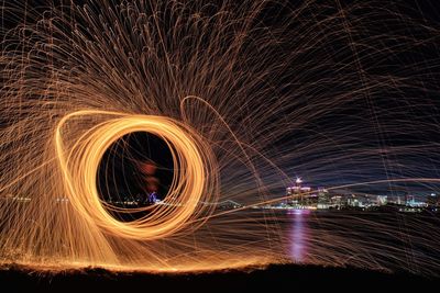 Full frame shot of illuminated fireworks against sky at night