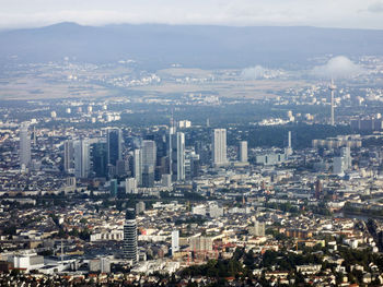 Aerial view of cityscape against sky