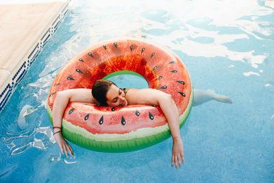 High angle view of boy in swimming pool