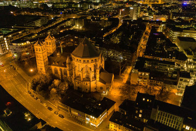 High angle view of illuminated buildings in city at night