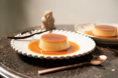 Close-up of cake slice in plate on table