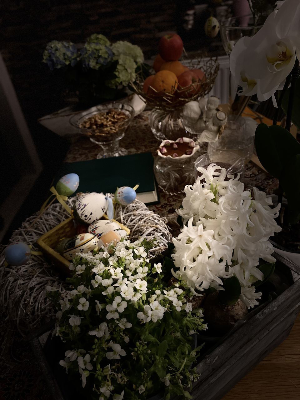 plant, flower, floristry, flowering plant, freshness, floral design, food and drink, food, high angle view, no people, nature, table, indoors, healthy eating, wellbeing, centrepiece, container, arrangement, flower arrangement, vegetable, bouquet, still life, basket, candle, beauty in nature