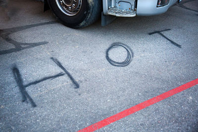 High angle view of bicycle sign on road