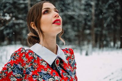 Close-up of young woman during winter