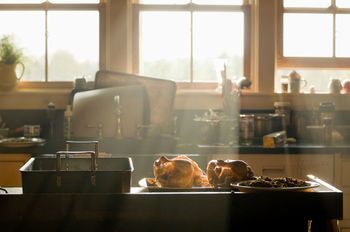 Turkey served on table in kitchen