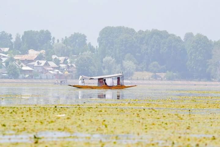 SCENIC VIEW OF CALM SEA AGAINST SKY