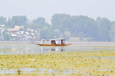 Scenic view of calm sea against clear sky