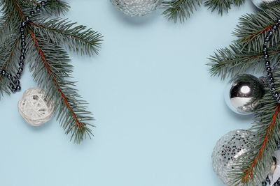 Directly above shot of christmas decorations on white background