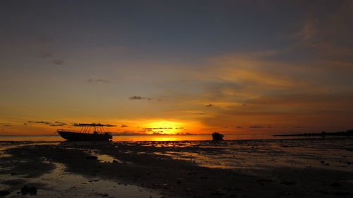 Scenic view of sunset over sea