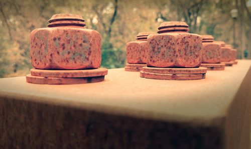 Close-up of rusty nuts and bolts