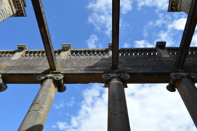 Low angle view of old bridge against sky