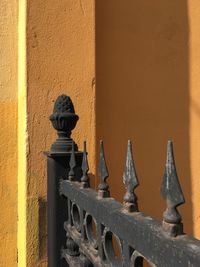 Close-up of metal sculpture against wall