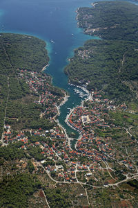 High angle view of city by sea