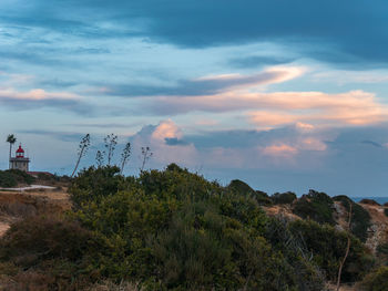 Scenic view of landscape against sky during sunset