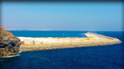 Scenic view of sea against clear blue sky