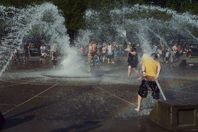 Blurred motion of people in water