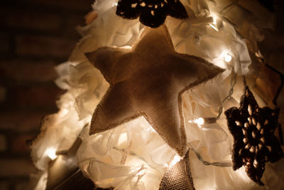 Close-up of illuminated christmas tree