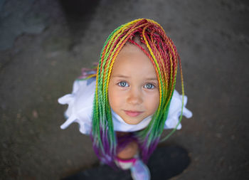Portrait of young woman wearing hat