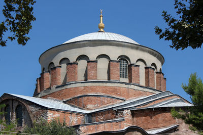 Low angle view of historical building against clear sky