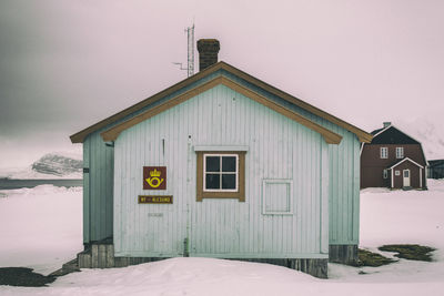 House against sky during winter