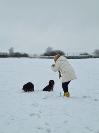 Women on field during winter