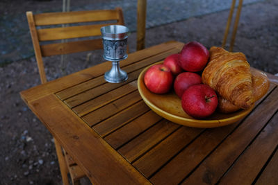 High angle view of apples in container on table