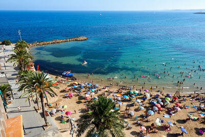 High angle view of crowd at beach in costa blanca