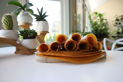 Close-up of potted plant on table at home