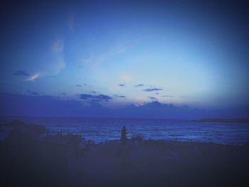 Scenic view of sea against sky at sunset