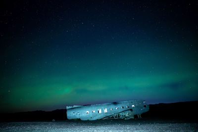 Scenic view of sea against sky at night