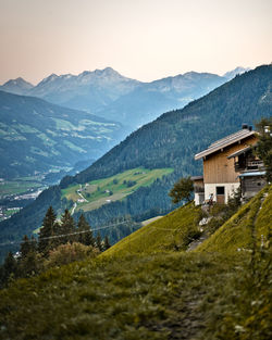 Scenic view of landscape and mountains against sky