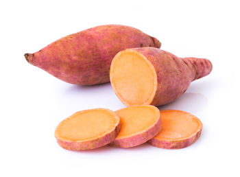 Close-up of fruit against white background