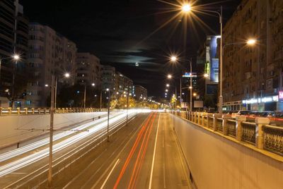 Light trails on city street at night
