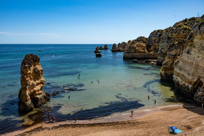 Scenic view of sea against blue sky