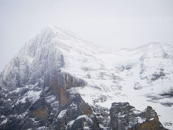 Snow covered mountain against sky