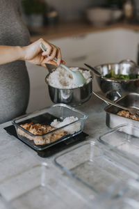 Pregnant woman preparing healthy lunch box