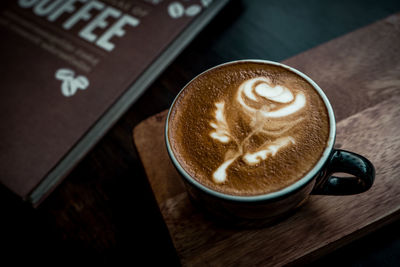 High angle view of cappuccino on table