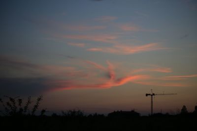 Silhouette trees against sky during sunset