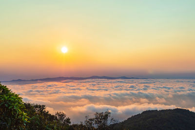 Scenic view of mountains against sky during sunset