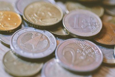 High angle view of coins on table