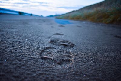 Surface level of wet sand on beach