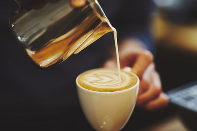 Close-up of coffee cup on table